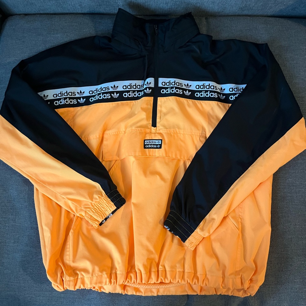 Adidas women’s Black and Orange track jacket